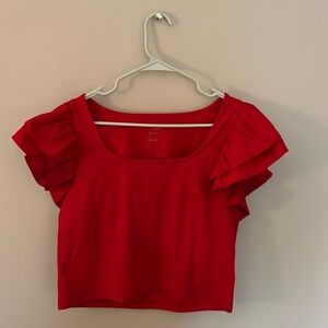 red tee with puffed sleeves
